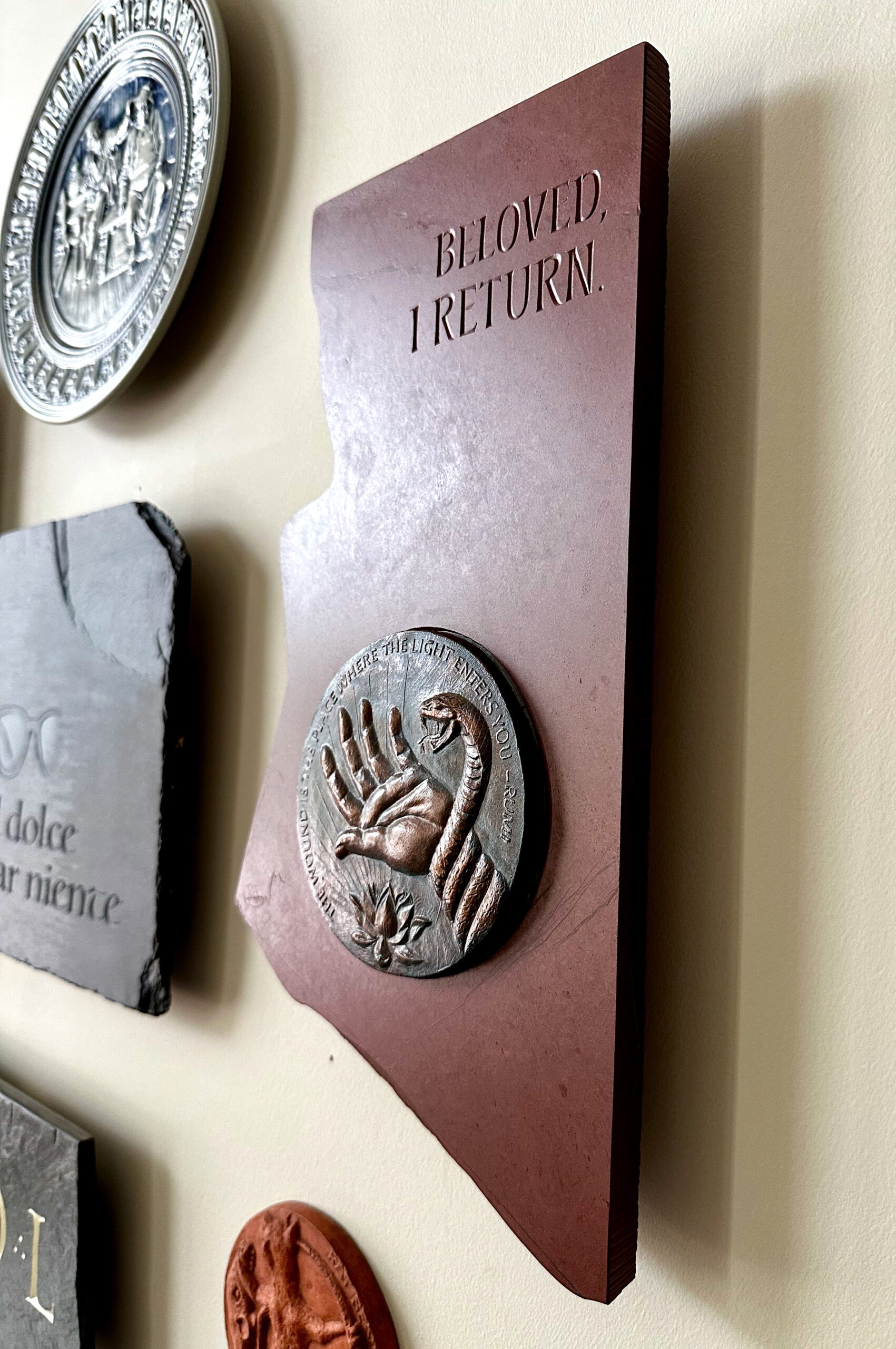 Wall gallery with several stone tablet inscriptions.
